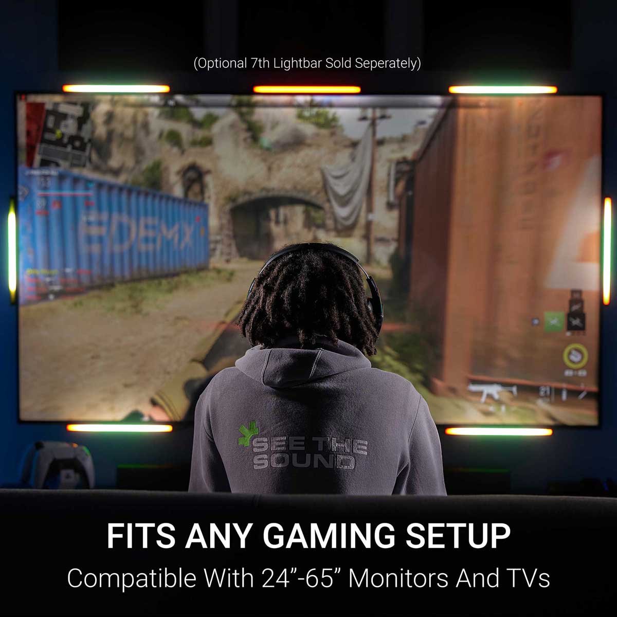 Gamer playing Call of Duty with Audio Radar light bars around a curved monitor showing directional sound visualization